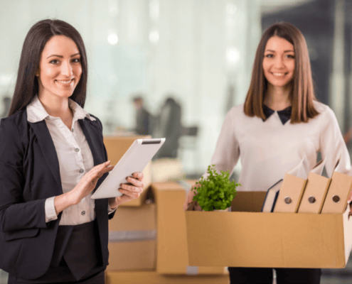 What Makes Professional Commercial Movers Worthwhile 9 Businesswomen with Moving Boxes | 3GuysMoving.com