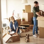 3 Tips for When You Need to Move as Quickly as Possible 1 young couple packing moving boxes | 3GuysMoving.com