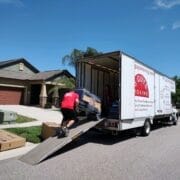 Carefully Loading Items into Moving Truck